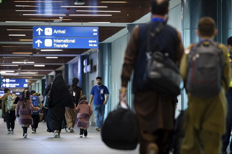 Scores of Afghans have left for the US after their visas were processed in the Philippines