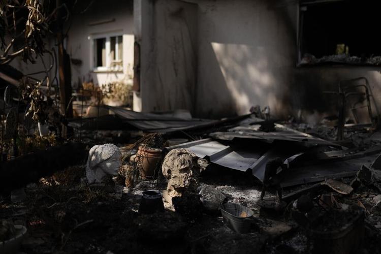 Ruins and memories of a paradise lost in an Israeli village where attackers killed, kidnapped dozens
