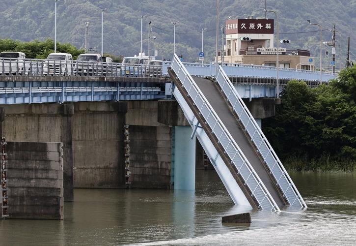 Rescuers search for the missing after Japan earthquake as death toll rises to 13