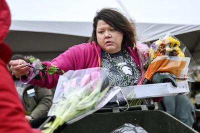 'Hard to do': Flowers removed after Michigan State shooting
