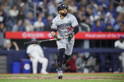 Santana's solo shot lifts Twins over Blue Jays 3-2 in rematch of wild-card series