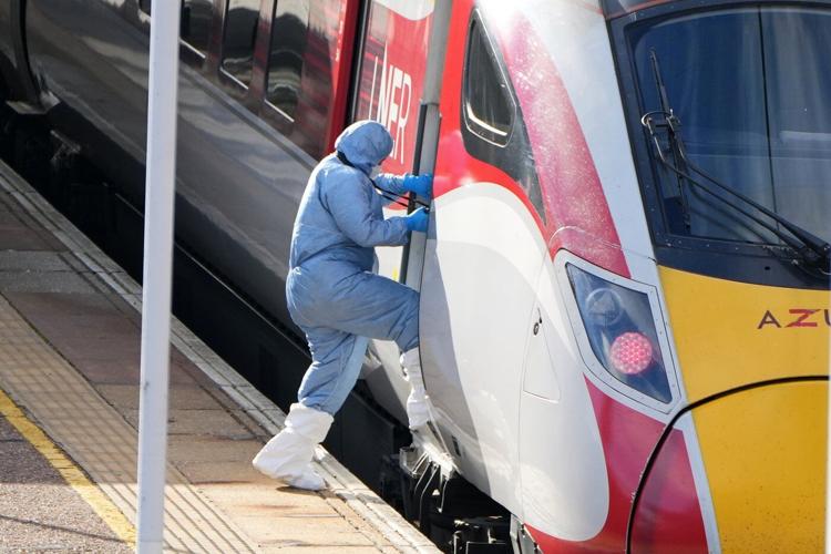 UK police charge man with attempted murder over train stabbing that wounded 11 people