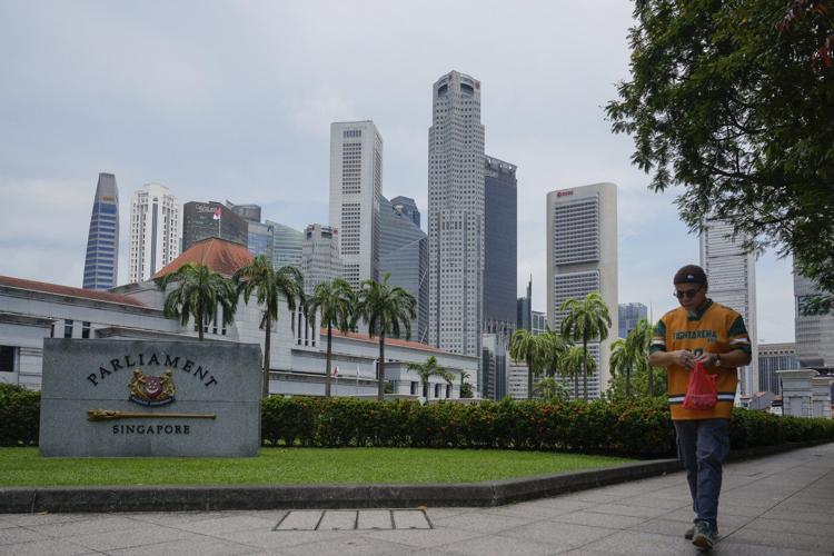 Voting underway in Singapore as its long-ruling party seeks a bigger win