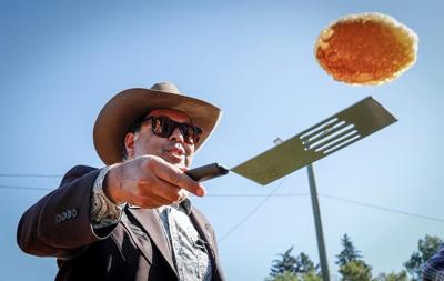 Alberta NDP leader Naheed Nenshi draws large crowd at Calgary Stampede breakfast