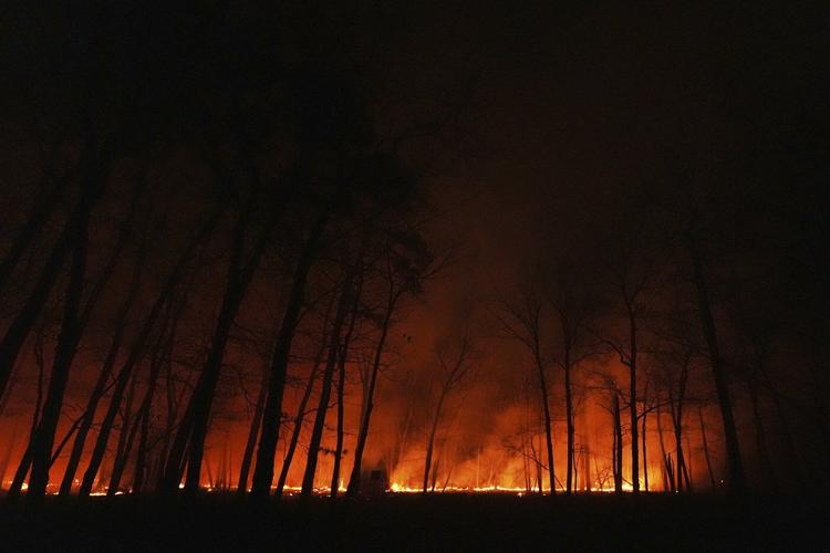 New Jersey forest fire prompts thousands of evacuations and closes a major highway