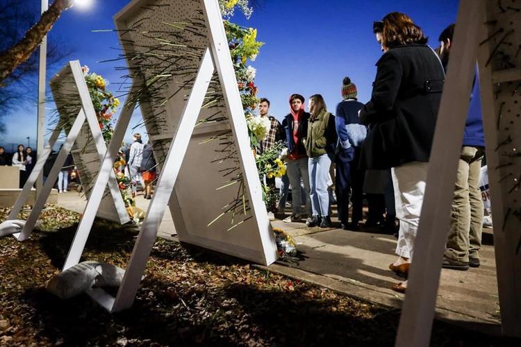 Virginia honors slain players in memorial service on campus