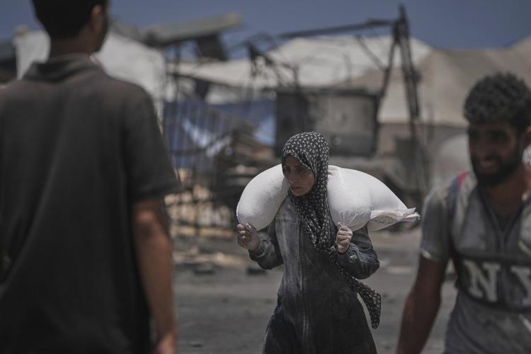 More than 100 aid groups warn of starvation in Gaza as Israeli strikes kill 21, officials say