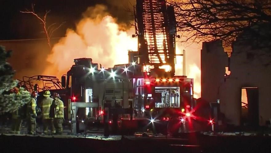 Industrial fire and multiple explosions shoot debris into the air in Detroit suburb