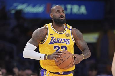 Buss family agrees to sell controlling stake of Lakers to Mark Walter for $10B, AP source says