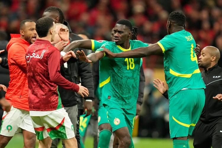 Chaos at Africa Cup of Nations final after Senegal players walk off field to protest penalty