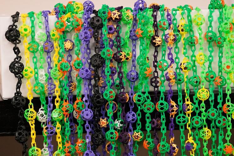 Biodegradable Mardi Gras beads help make Carnival season more sustainable
