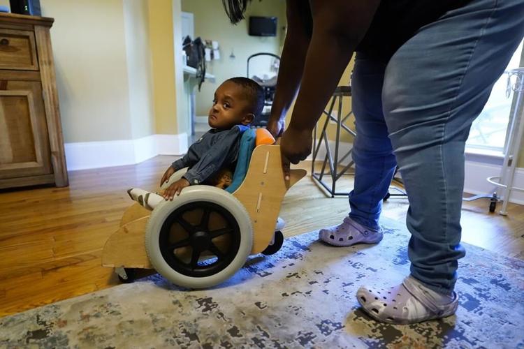 Custom made by Tulane students, mobility chairs help special needs toddlers get moving