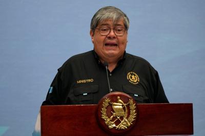 Guatemala's president accepts resignations of top security officials after gang escape