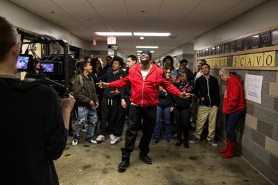 Program's head says Iowa school shooting won't deter him