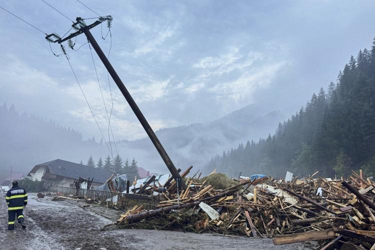 Flash floods in Romania kill at least 3 people and force hundreds of evacuations
