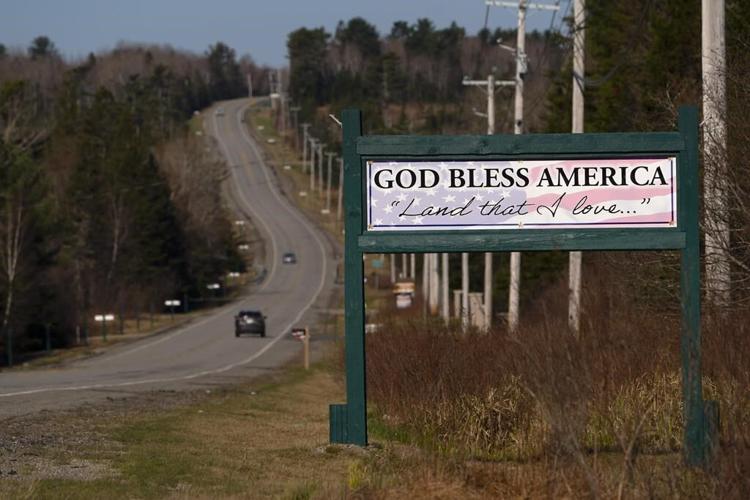They envision the world's tallest flagpole in this Maine town. Instead of uniting, it is dividing