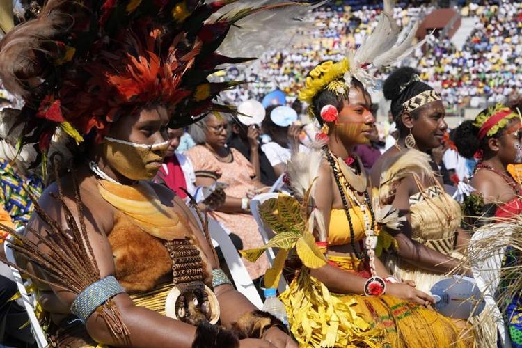 Pope brings in a ton of humanitarian aid, toys to remote Papua New Guinea as he celebrates periphery