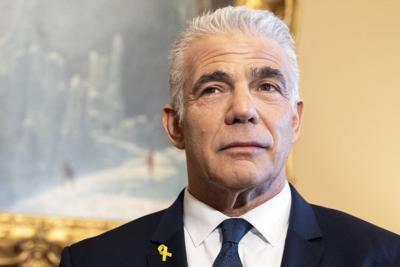 Israeli opposition leader Lapid rallies behind Iran operation, after months of criticizing Netanyahu