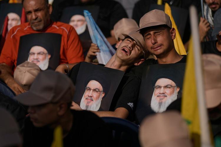 Photos show Hezbollah supporters honoring slain leaders Nasrallah and Safieddine despite PM's ban