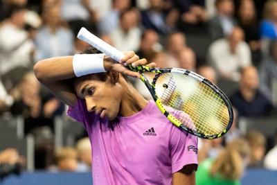 Auger-Aliassime qualifies for ATP Finals with close win over Ymer in Paris