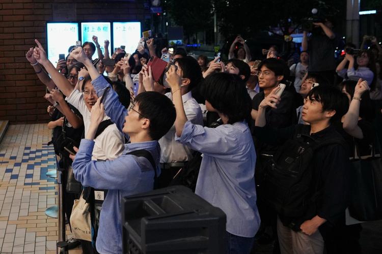 Fans mark the release of new Haruki Murakami novel at a midnight event in Tokyo
