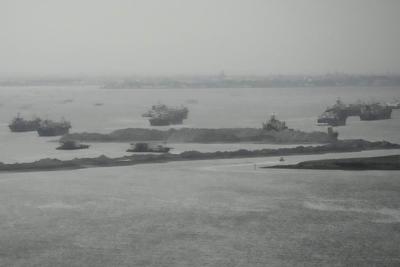 The US is concerned with blacklisted Chinese firm's hand in island-building near its Manila embassy