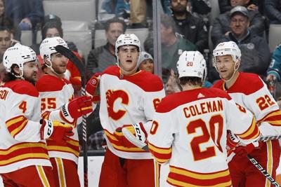 Toffoli and Kadri both score twice, Flames beat Sharks 7-3