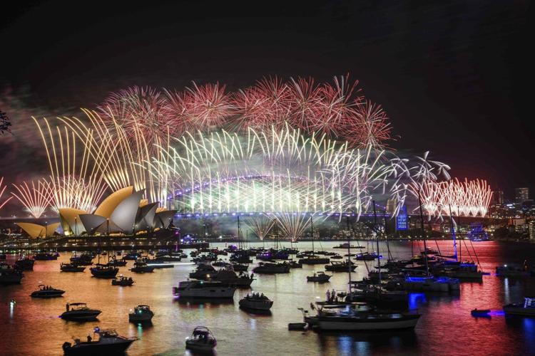 The world welcomes 2025 with light shows, embraces and ice plunges