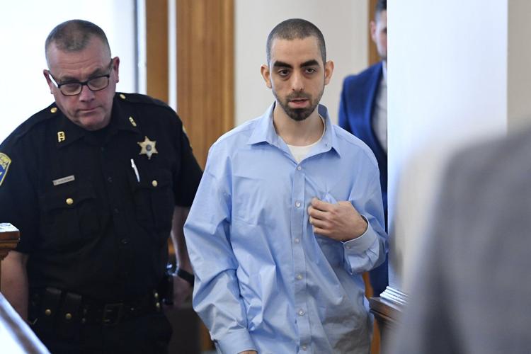 Prosecutor says Salman Rushdie was too stunned to react when a man started to stab him