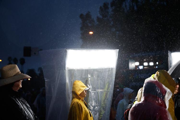 Rain soaks Rose Parade in California and snow squalls hit Midwest and Northeast on first day of 2026