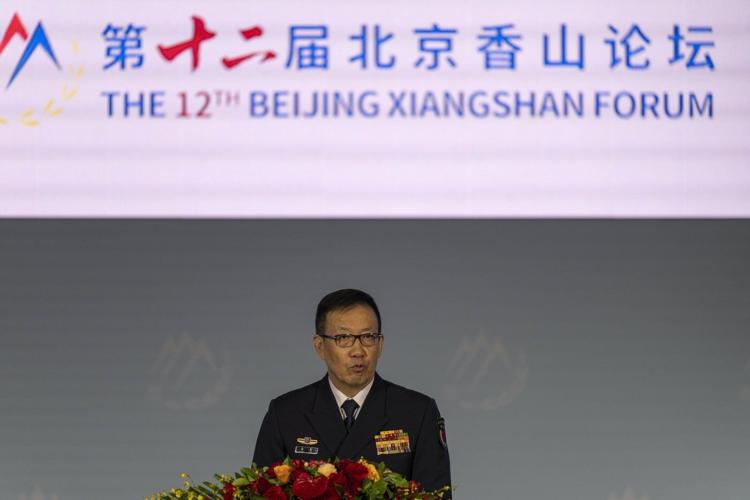 China's defense minister renews threats to take over Taiwan as he opens security forum
