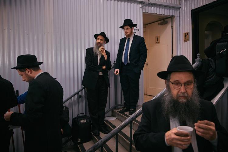 Photos of Hasidic Jewish rabbis praying at resting place of 'the Rebbe' in New York