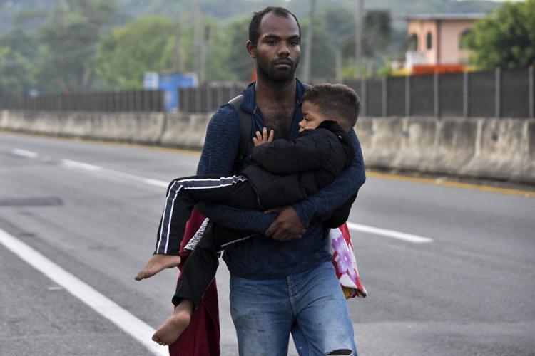 Mexico drops migrants in troubled resort as it disperses them far from US border