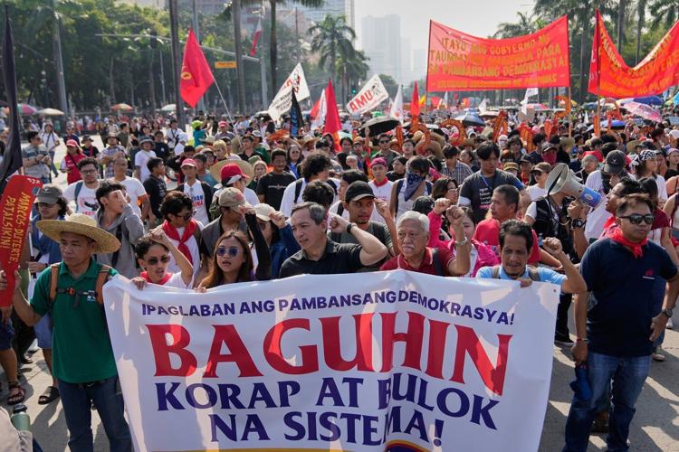 Philippine president says 7 suspects in corruption scandal have been detained, others being sought