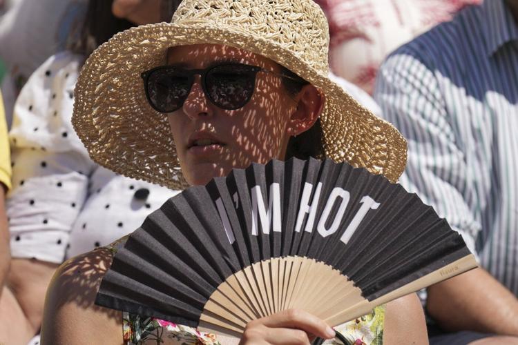 Taylor Fritz sends water bottle to unwell fan as heat impacts Wimbledon again