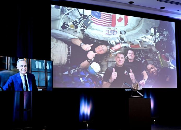 Carney praises Hansen, calls hearing French from space a point of pride