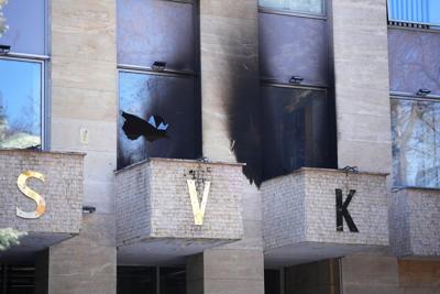 Czech police arrest a man who claimed responsibility for attack on a Russian center in Prague
