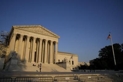 She got $0 from condo sale. Supreme Court weighs fairness
