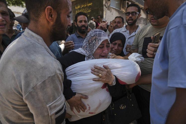 Photos show Gaza's deadliest day for Palestinians looking for food after more than 80 are killed