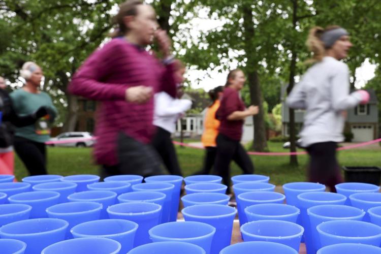 This runner was bothered by blizzard of disposable cups at races. She invented something better