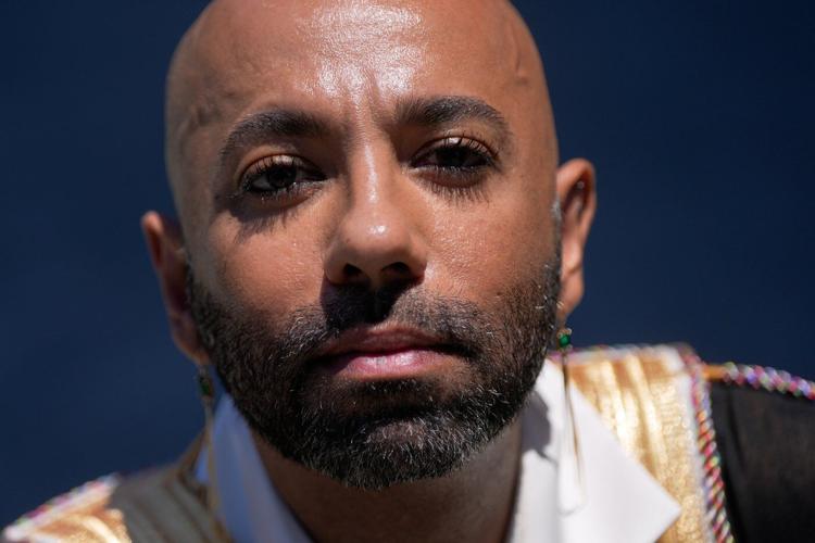 In a rainbow-trimmed robe at the World Cup, a gay Qatari doctor advocates for equal rights