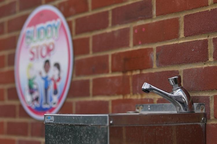 With poor ventilation and children packed in, UK's outdated schoolhouses swelter in the heat