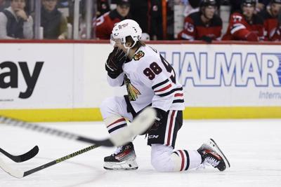 Blackhawks star Bedard back after missing almost six weeks with broken jaw