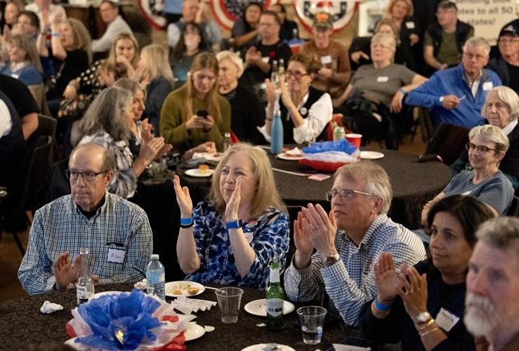 ��ɫtvs gather for camaraderie, food and drink at U.S. election night watch parties