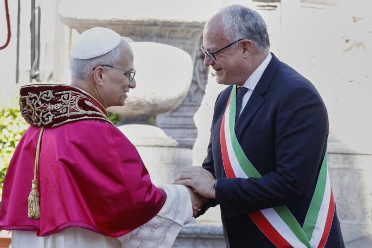 Pope Leo XIV declares 'I am Roman!' as he completes formalities to become bishop of Rome