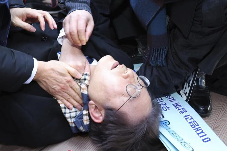 South Korean opposition leader is attacked and injured by an unidentified man