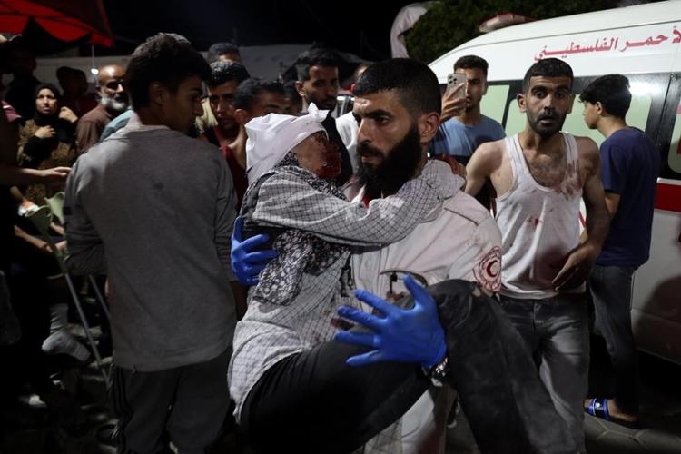 The Latest | Israeli troops launch attacks in central Gaza, possibly widening their offensive