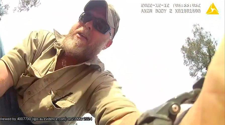 Coroner says Australian extremists who killed police officers had shared delusional disorder