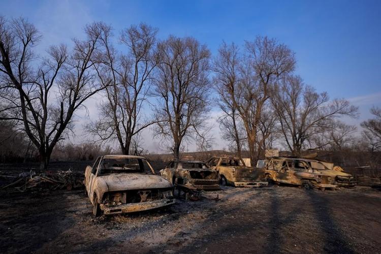 Wildfire grows into one of largest in Texas history as flames menace multiple small towns