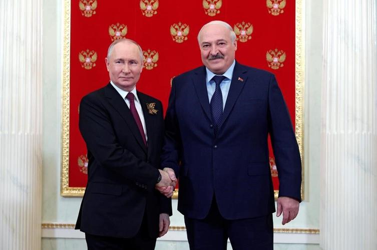 Photos of Belarus leader emerge after days of absences that sparked health rumors